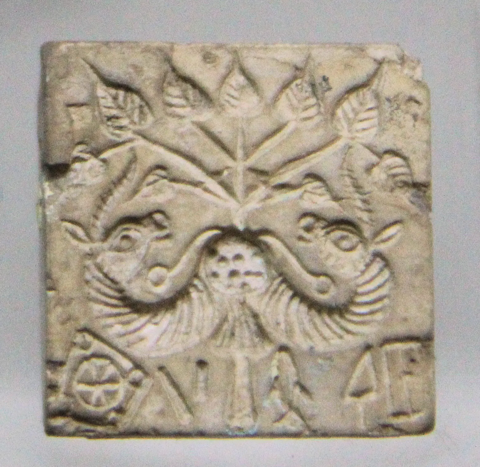 Harappan seals showing the so-called unicorn motif and Indus script